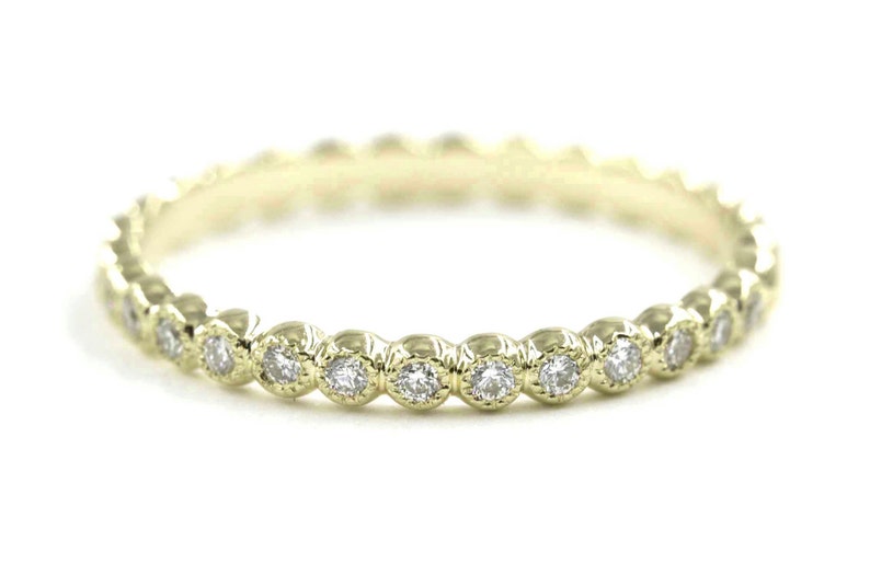 14K 0.15CT DIAMOND BEZEL MILGRAIN BAND