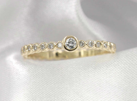 14K 0.15CT DIAMOND BEZEL BEADED RING