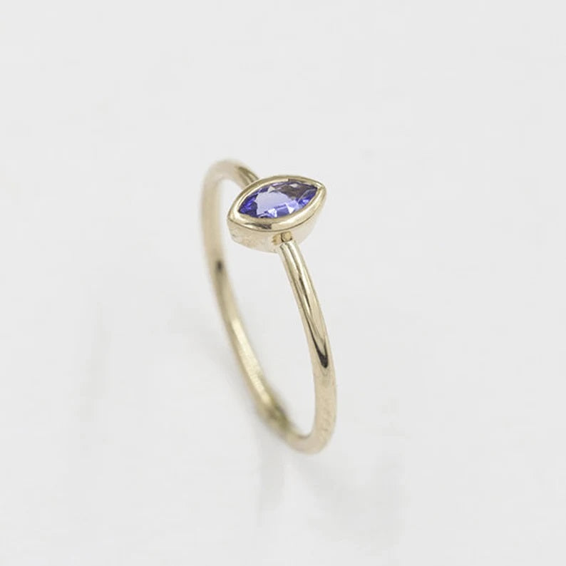 14K MARQUISE TANZANITE BEZEL SOLITAIRE RING