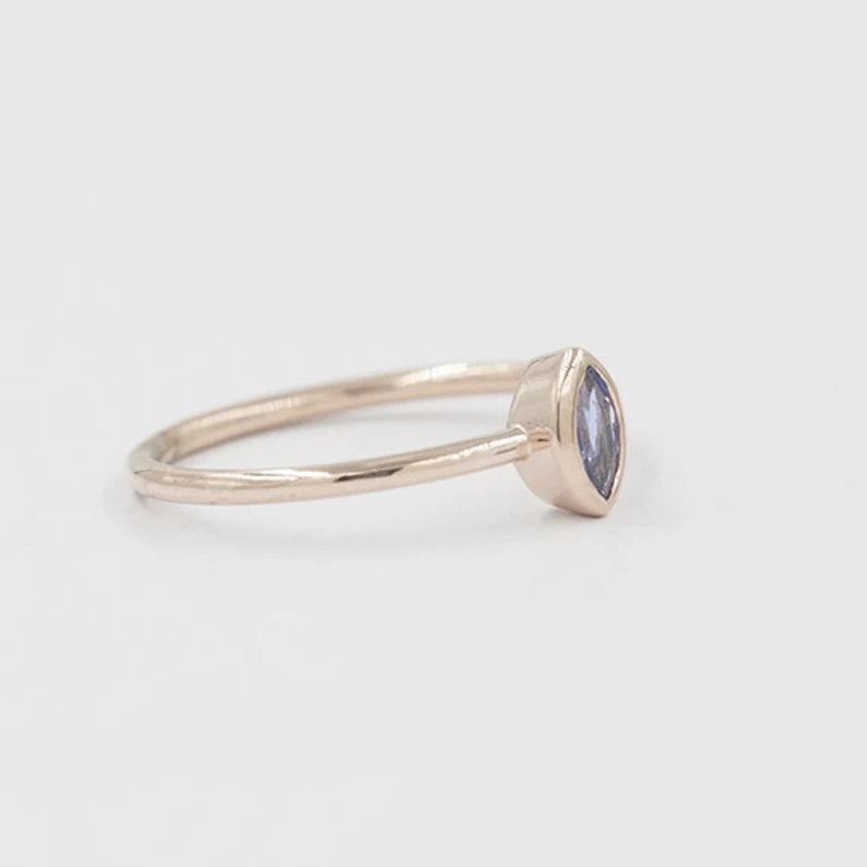 14K MARQUISE TANZANITE BEZEL SOLITAIRE RING