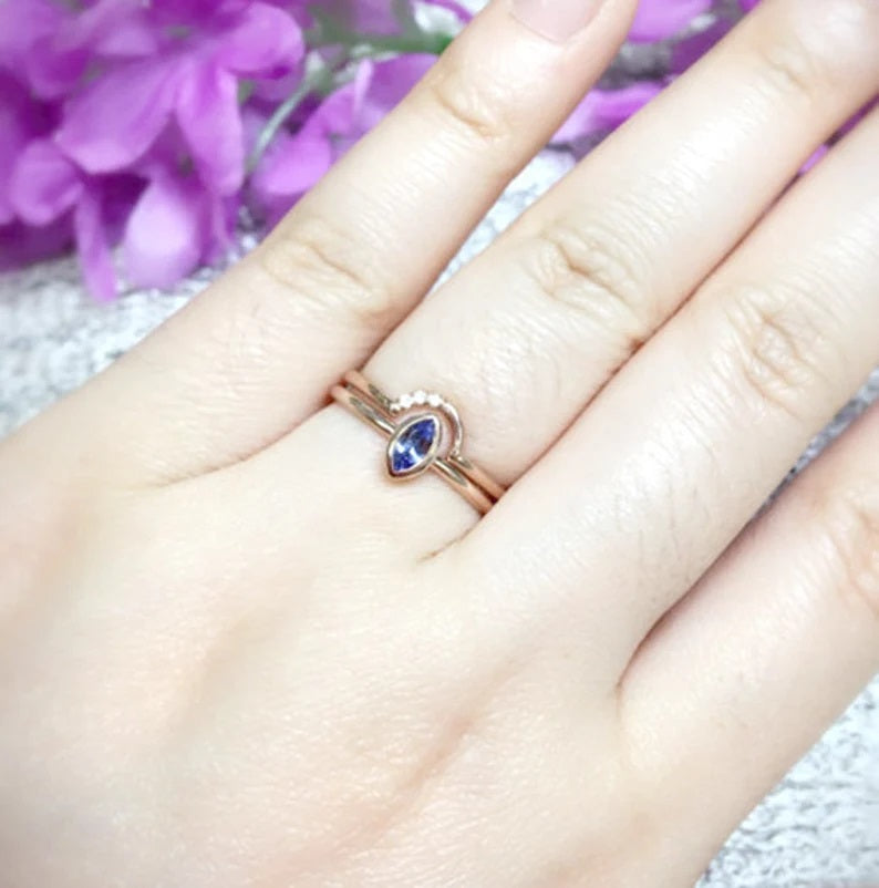 14K MARQUISE TANZANITE BEZEL SOLITAIRE RING