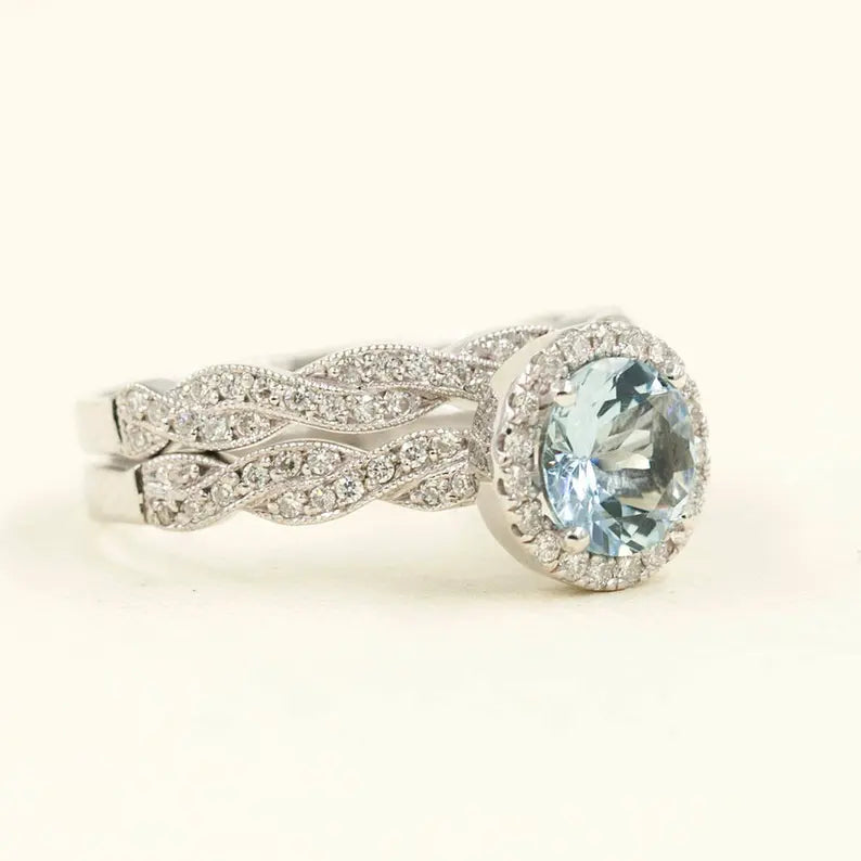 14K AQUAMARINE DIAMOND HALO TWIST RING