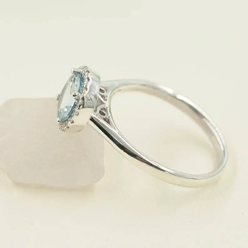 14K AQUAMARINE DIAMOND HALO SOLITAIRE RING