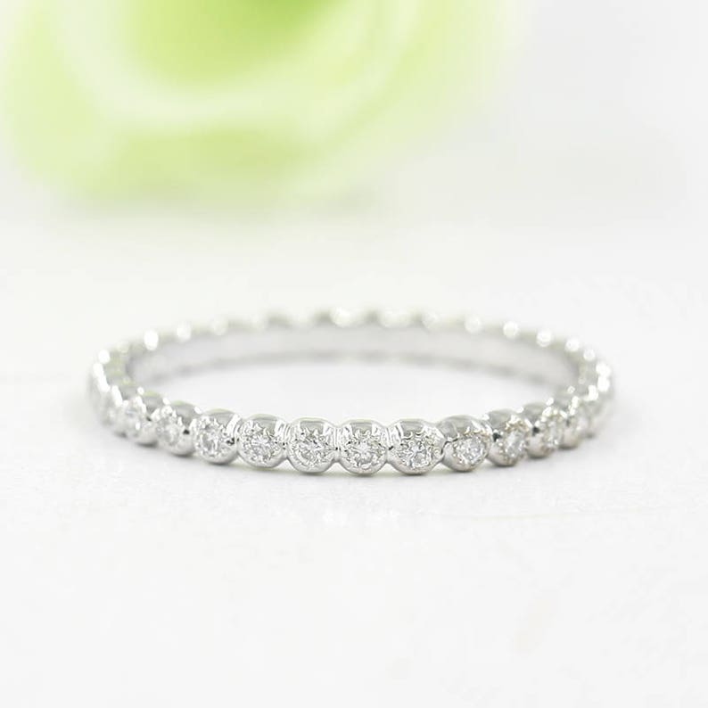 14K 0.15CT DIAMOND BEZEL MILGRAIN BAND