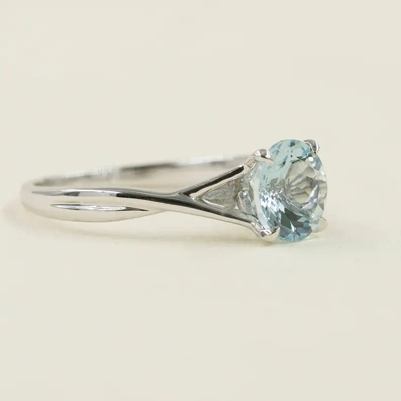 14K AQUAMARINE TWIST SOLITAIRE RING