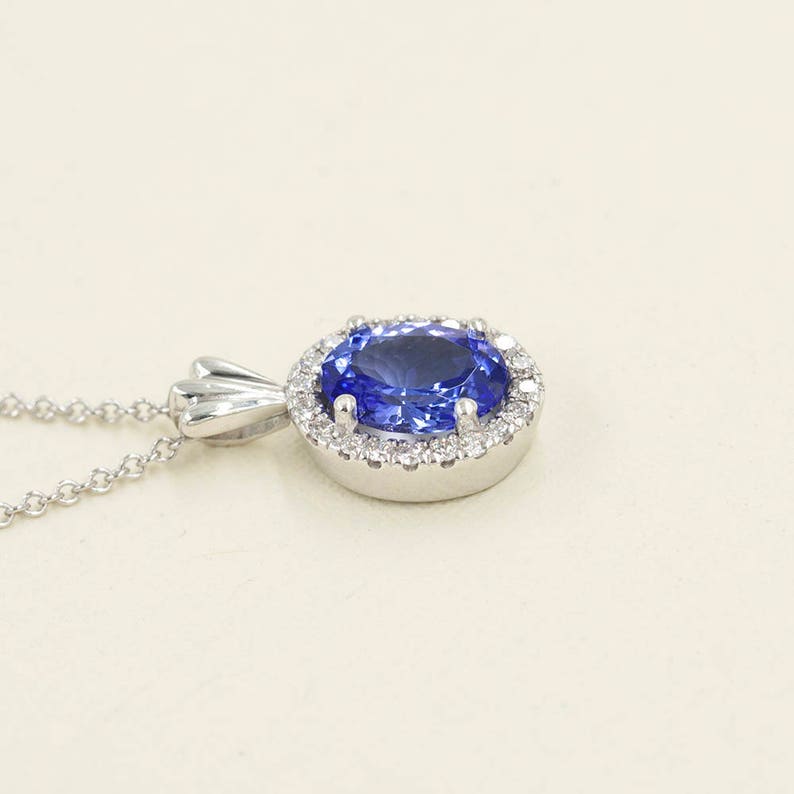 14K OVAL TANZANITE DIAMOND HALO NECKLACE