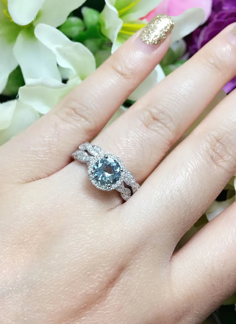 14K AQUAMARINE DIAMOND HALO TWIST RING