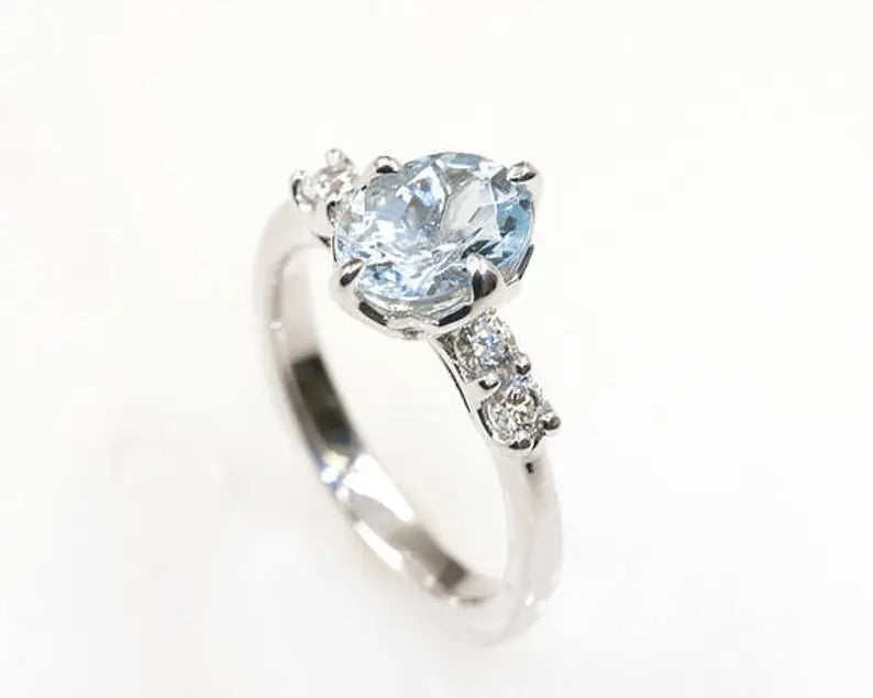 14K OVAL AQUAMARINE DIAMOND RING