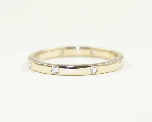 14K 8 DIAMOND BEZEL BAND