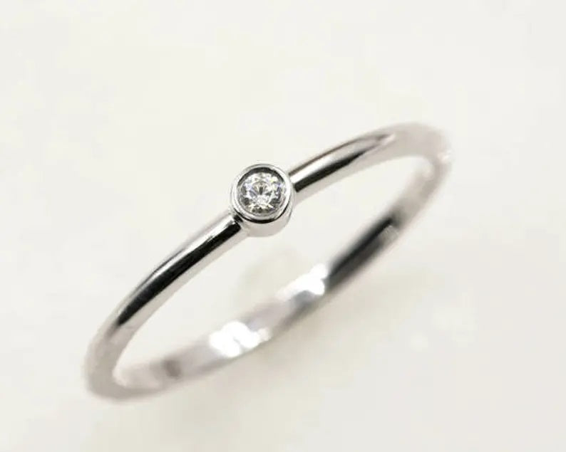 14K 0.035CT DIAMOND BEZEL SOLITAIRE RING