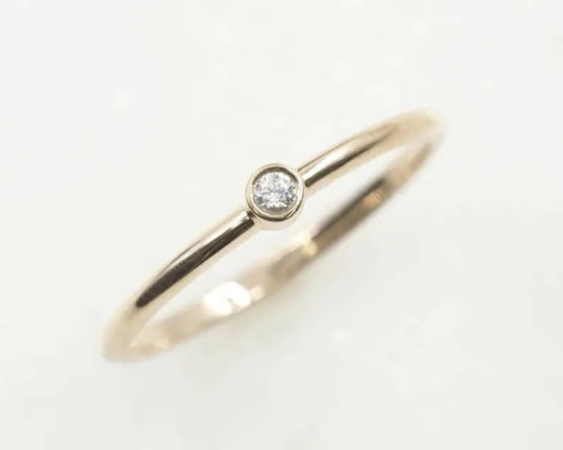 14K 0.035CT DIAMOND BEZEL SOLITAIRE RING