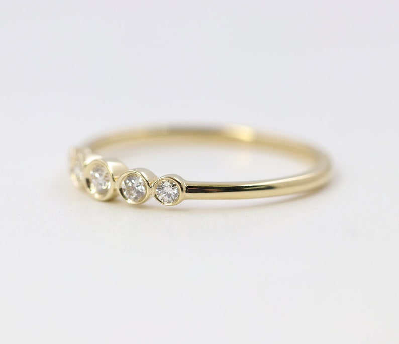 14K 0.18CT DIAMOND BEZEL BAND