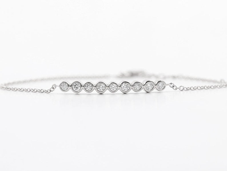 14K 9 DIAMOND BEZEL BAR BRACELET