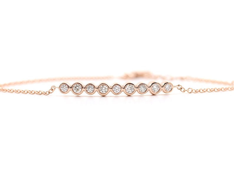 14K 9 DIAMOND BEZEL BAR BRACELET