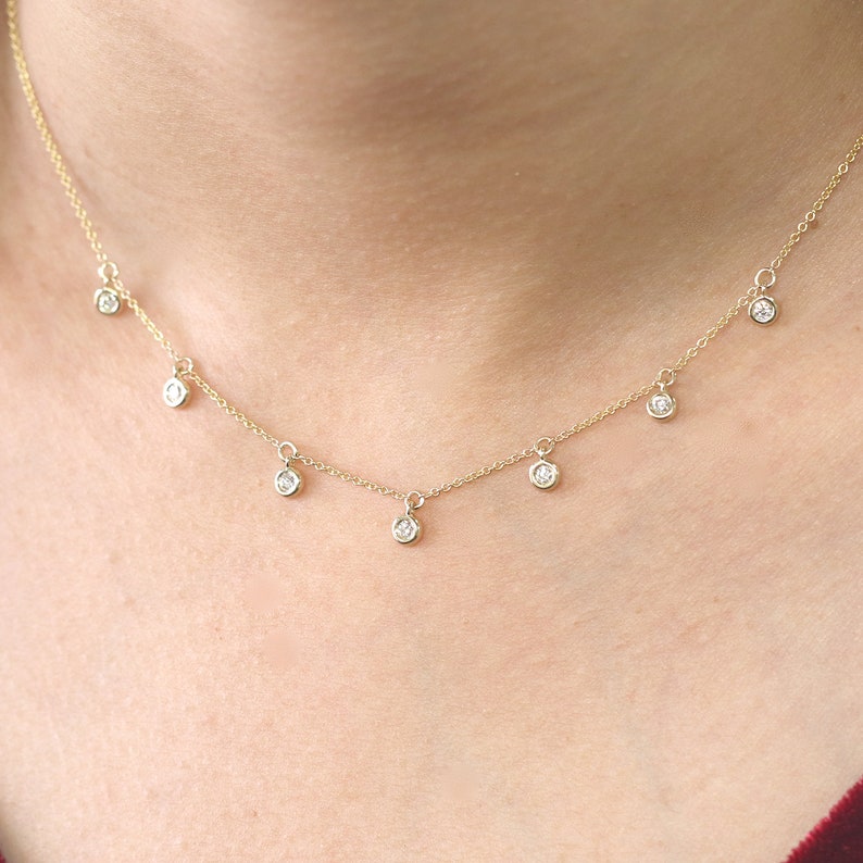 14K 7 DIAMOND BEZEL DANGLING NECKLACE