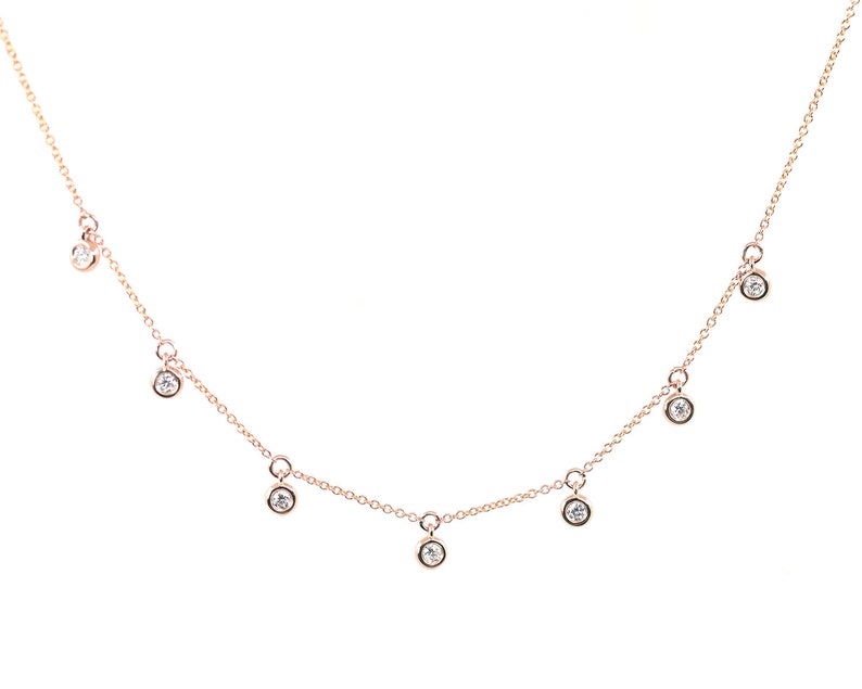 14K 7 DIAMOND BEZEL DANGLING NECKLACE