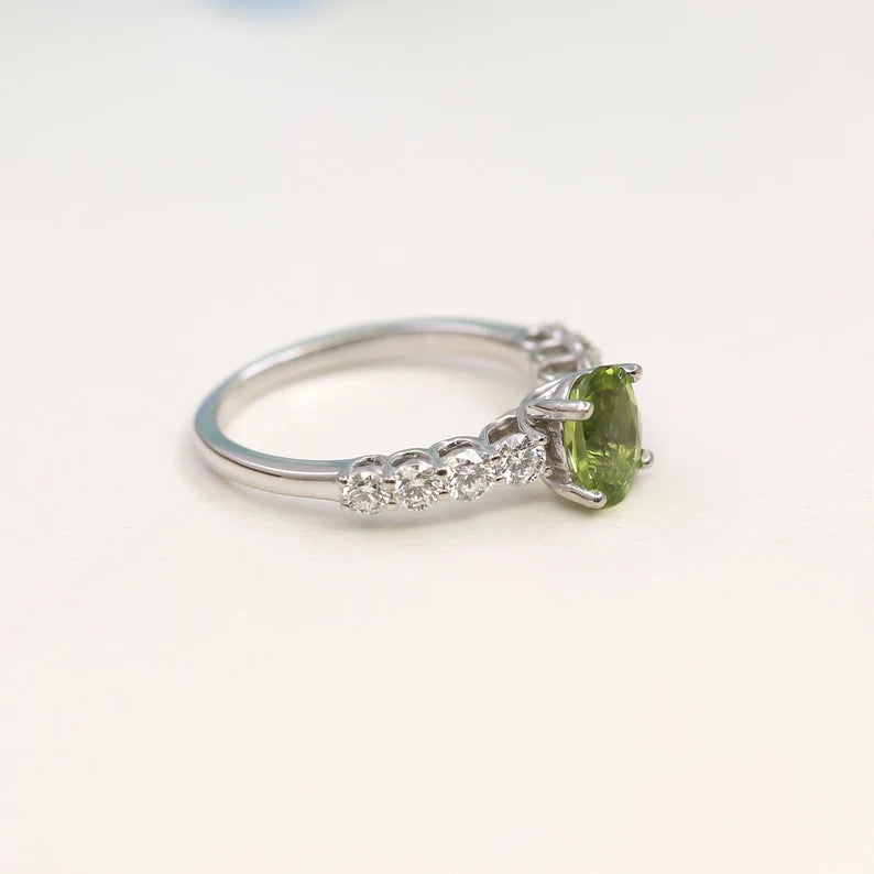 14K OVAL PERIDOT DIAMOND RING