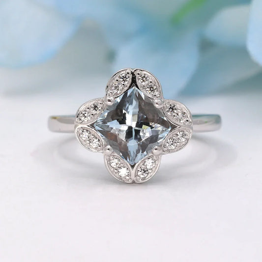 14K CUSHION AQUAMARINE DIAMOND FLOWER RING