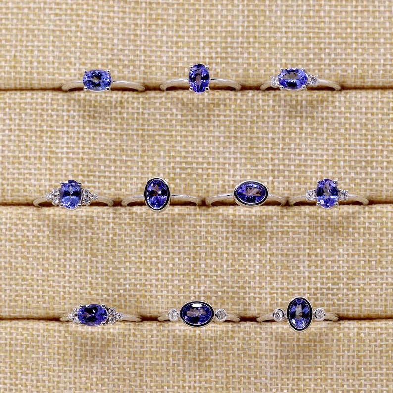 14K OVAL TANZANITE DIAMOND BEZEL RING