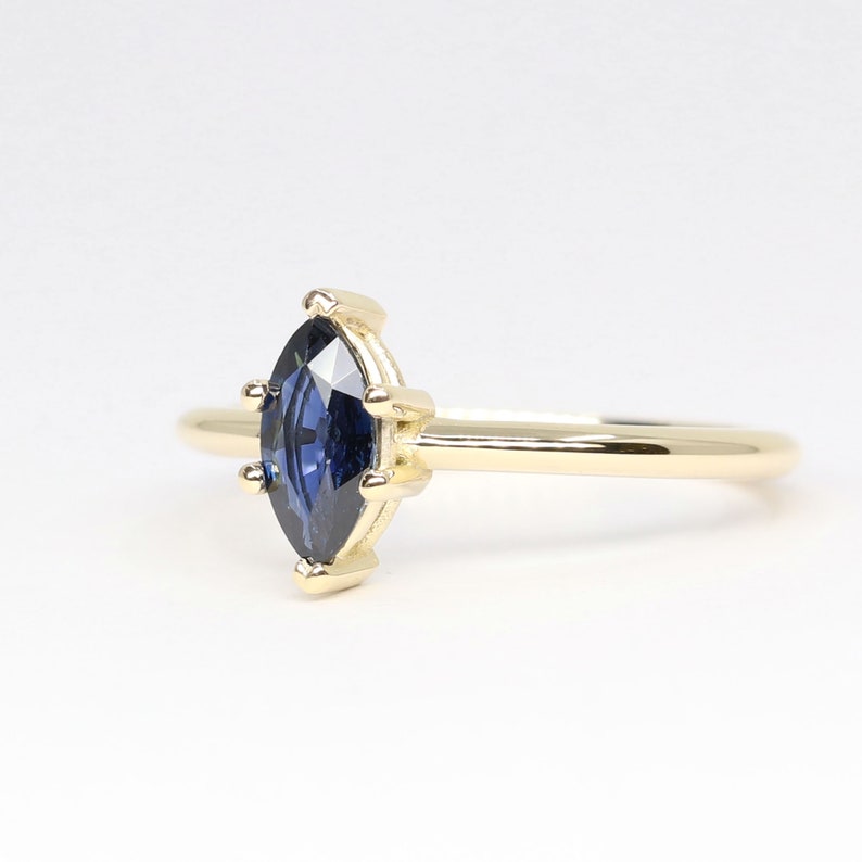 14K MARQUISE SAPPHIRE SOLITAIRE RING