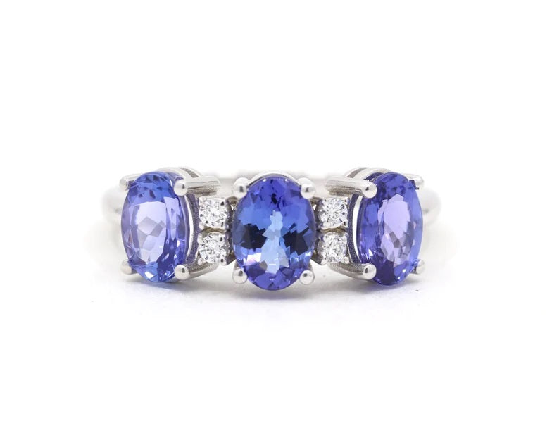 14K OVAL TANZANITE 4 DIAMOND BAND