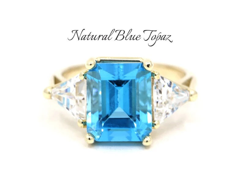 14K BLUE TOPAZ TRILLION CZ RING