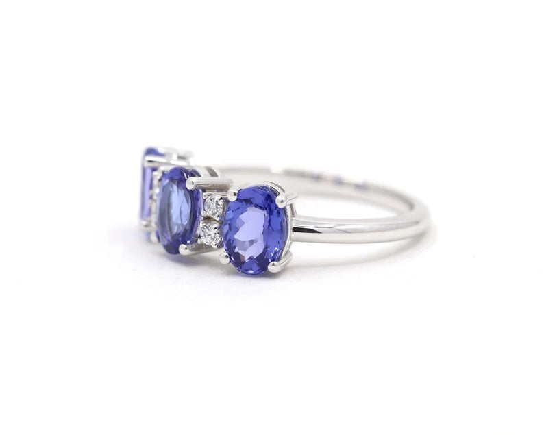 14K OVAL TANZANITE 4 DIAMOND BAND