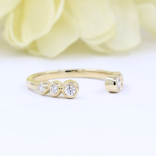 14K 0.20CT DIAMOND BEZEL OPEN BAND