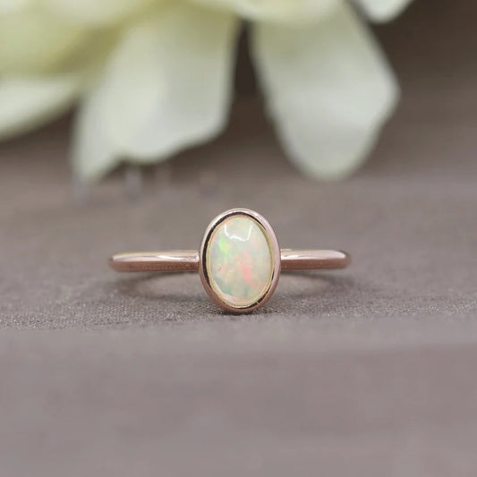 14K OVAL OPAL BEZEL SOLITAIRE RING