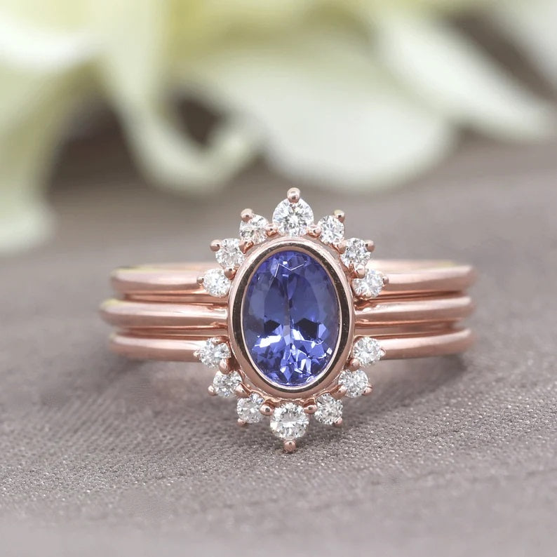 14K OVAL TANZANITE BEZEL SOLITAIRE RING