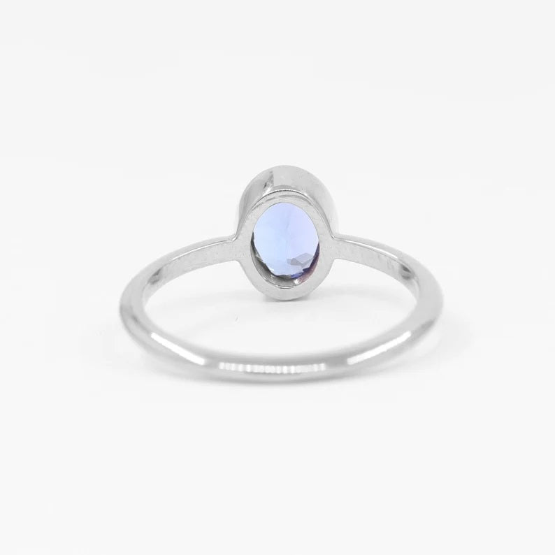 14K OVAL TANZANITE BEZEL SOLITAIRE RING