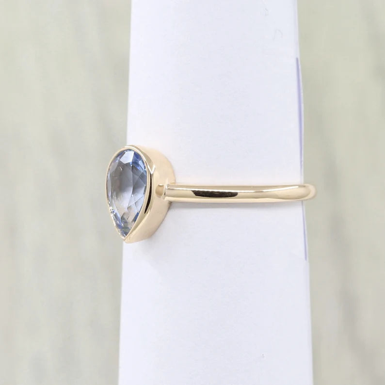 14K PEAR AQUAMARINE BEZEL SOLITAIRE RING