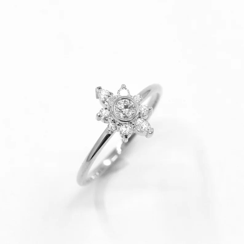 14K DIAMOND BEZEL FLOWER RING