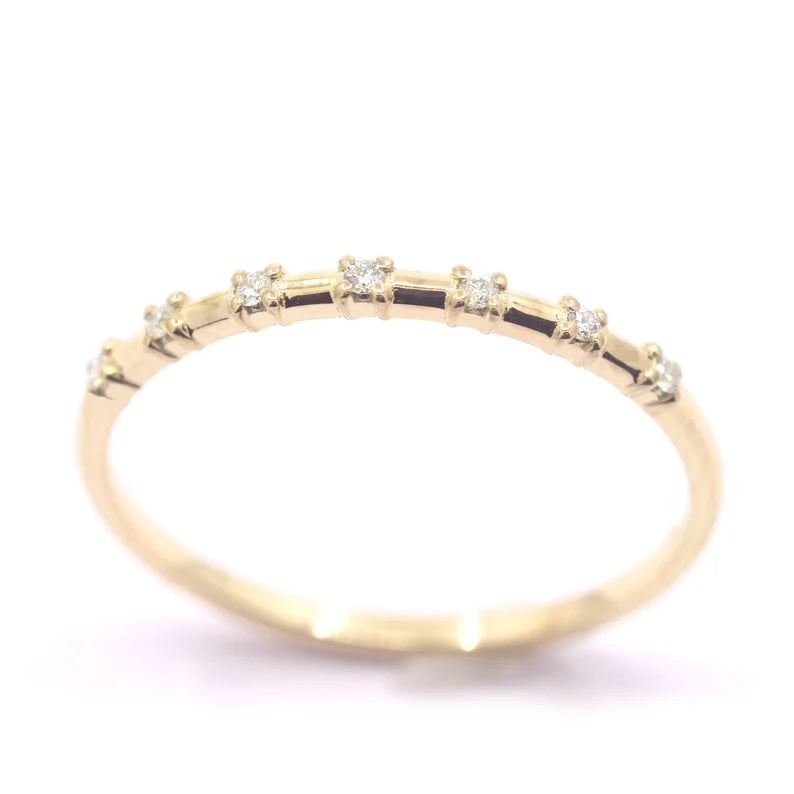 14K 7 DIAMOND SPACED 1.2MM BAND