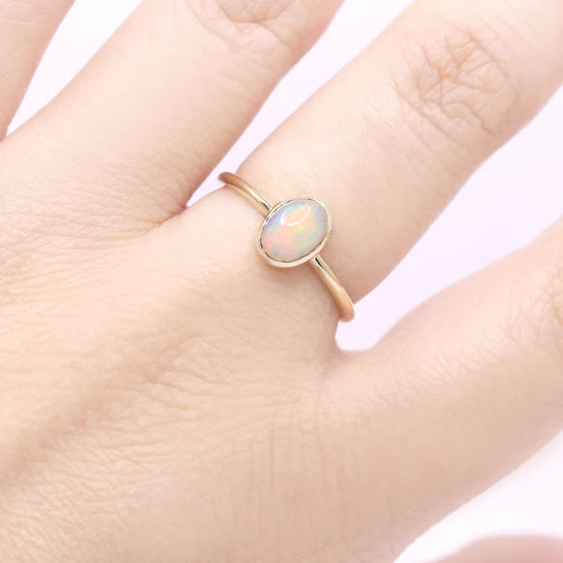 14K OVAL OPAL BEZEL SOLITAIRE RING