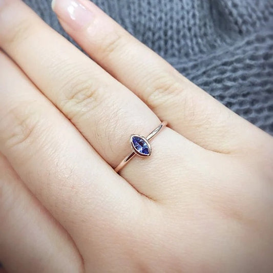 14K MARQUISE TANZANITE BEZEL SOLITAIRE RING