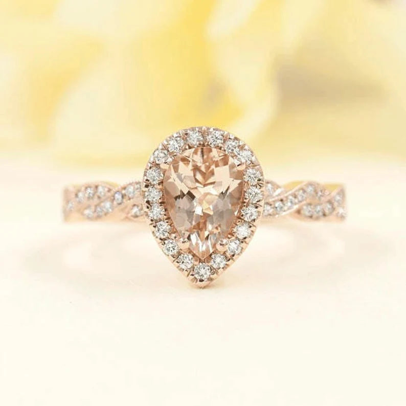 14K PEAR MORGANITE DIAMOND HALO TWIST RING